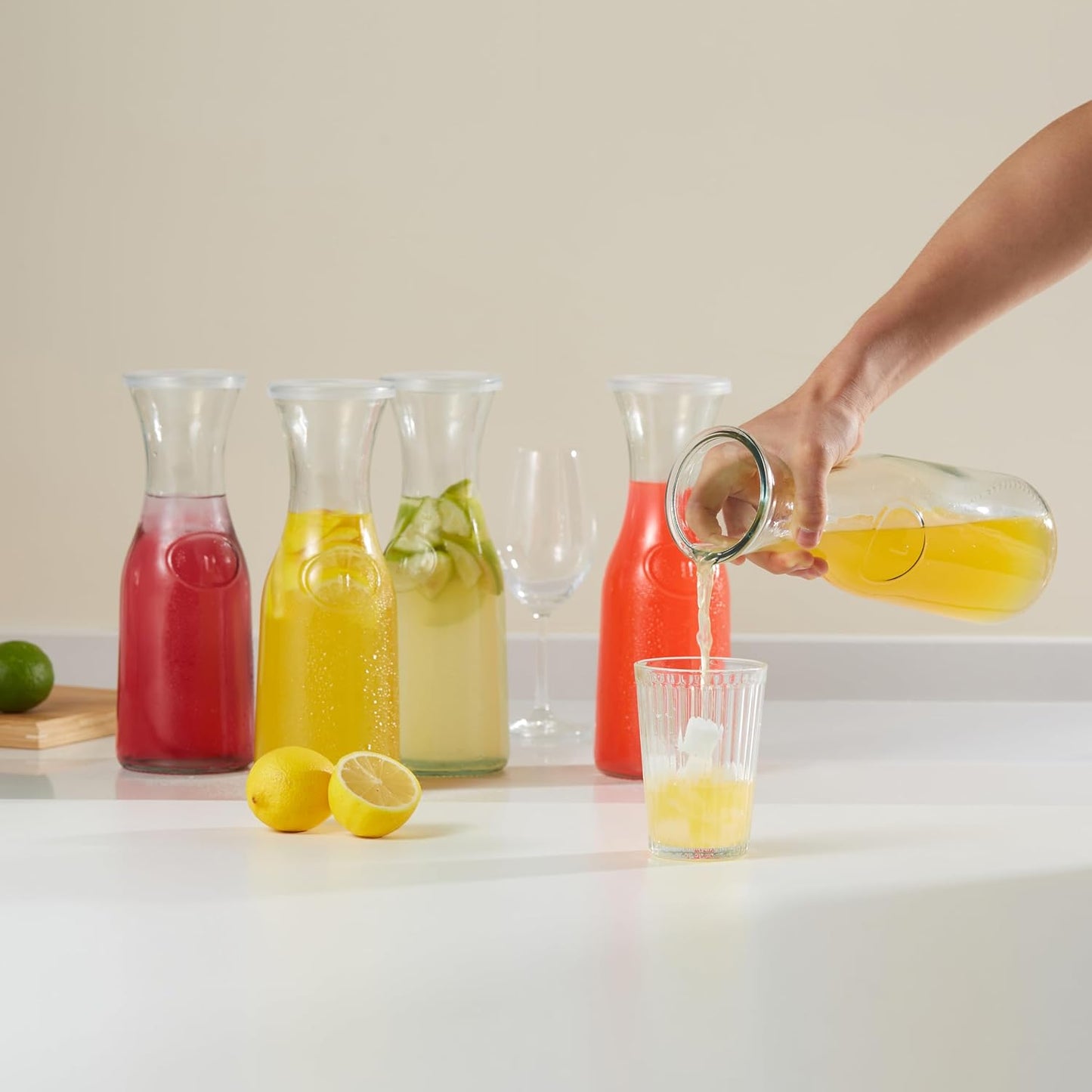 Kook Glass Carafe, Mimosa Bar Supplies, Carafe Pitchers with Lid, Glass Water Pitcher, Drink Dispensers for Parties, Tea, Wine, and Juice, Plastic Lids, Dishwasher Safe, 35 oz (set of 4)
